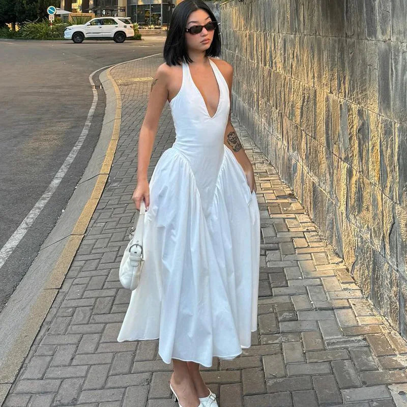 TARUXY Sexy Deep V Hollow Halterneck Large Hem Dress For Women Solid High Waisted Backless Splice Summer New Vacation Long Dress